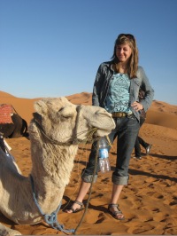 Megan contemplates camel